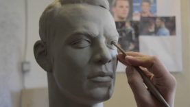 Sculpting a head in clay
