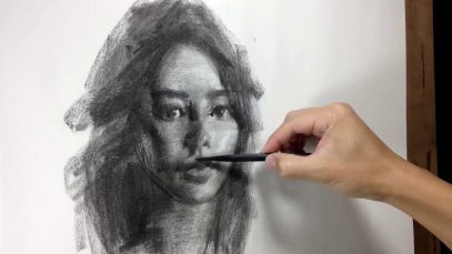 Drawing portrait in charcoal