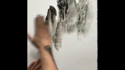 Watch and learn from this Chinese artist who can create an ink painting with his bare hand