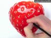 How to paint a realistic strawberry in watercolor by Anna Mason