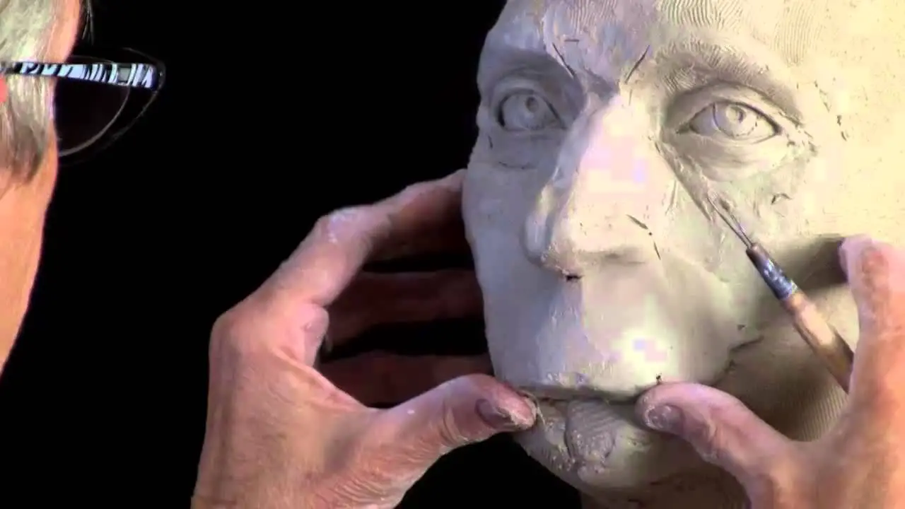 Sculpting a head in clay 