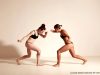 Anatomy references of two girls doing capoeira