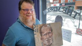 Artist creates gritty oil on cardboard paintings to raise funds for Smiths Falls Mission